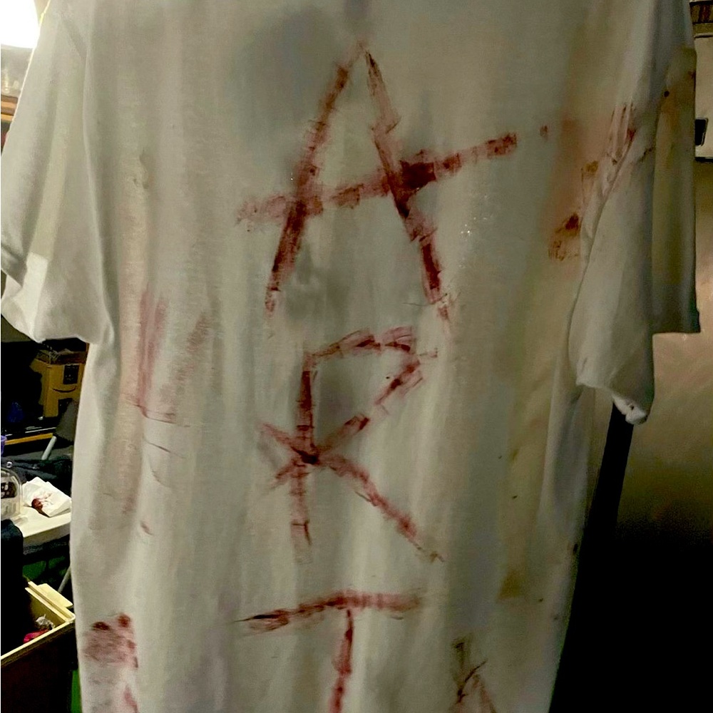 A hand customized terrifyer tee shirt made by @jerrycusyoms